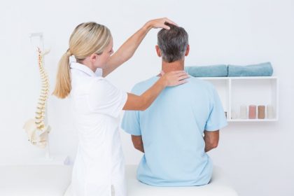 Doctor doing neck adjustment subluxation
